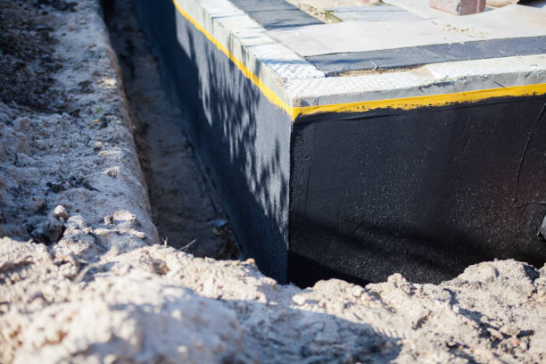 Professional Waterproofing technician working in Crestwood, KY